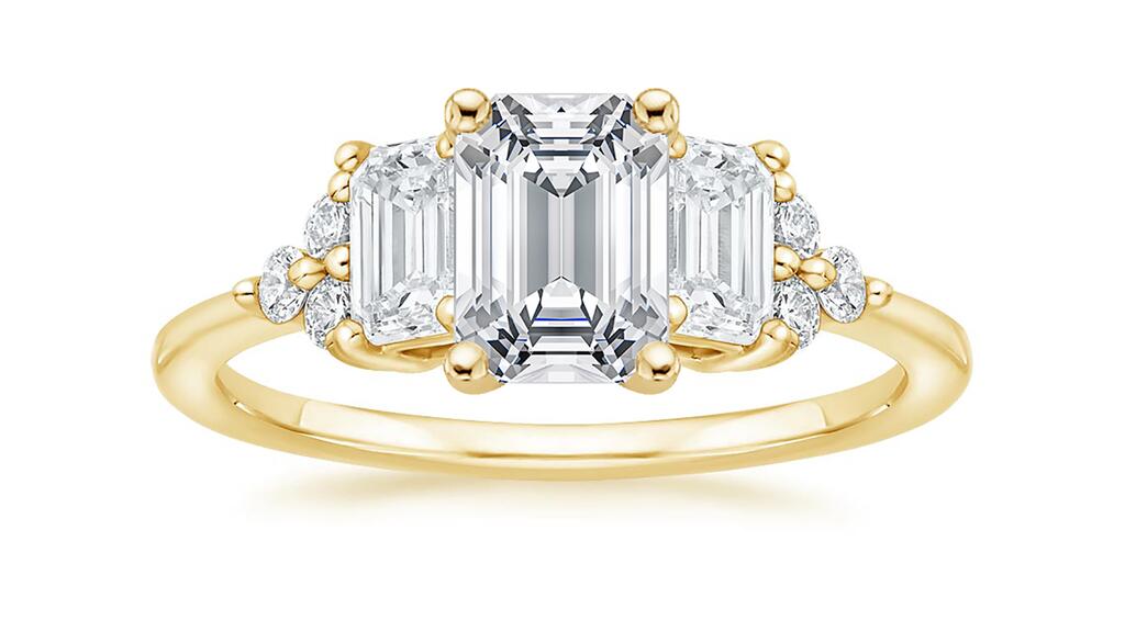 The “Sabine” cluster diamond engagement ring in 18-karat yellow gold ($3,790) Brilliant Earth Sabine diamond engagement ring